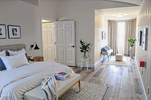 1624 N Torrey Pines Dr Unit 101, Las Vegas, NV 89108 - bedroom with wood finished floors and baseboards