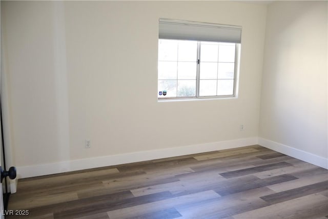 1624 N Torrey Pines Dr Unit 101, Las Vegas, NV 89108 - unfurnished room featuring baseboards and wood finished floors