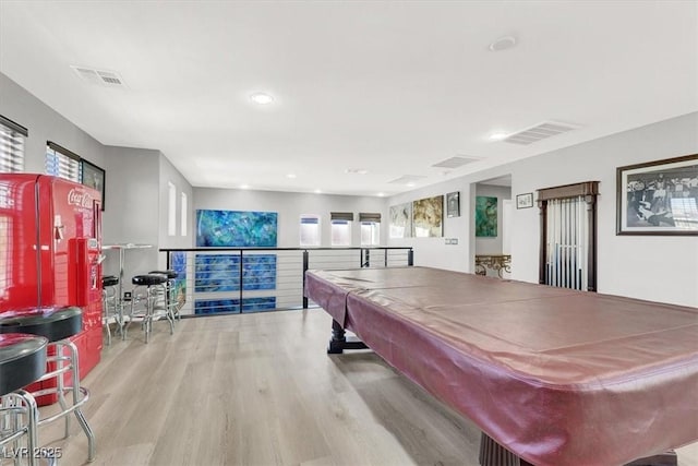 playroom with light wood finished floors, billiards, and visible vents