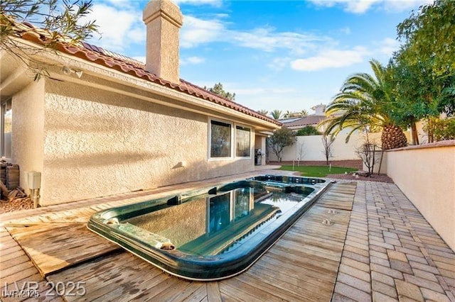 view of pool with fence