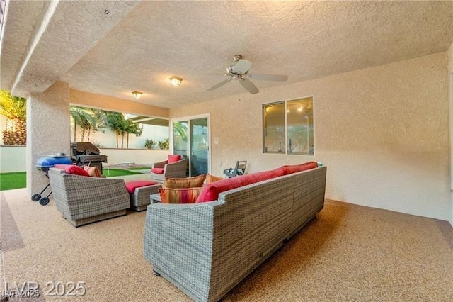 view of patio / terrace featuring an outdoor hangout area and a ceiling fan