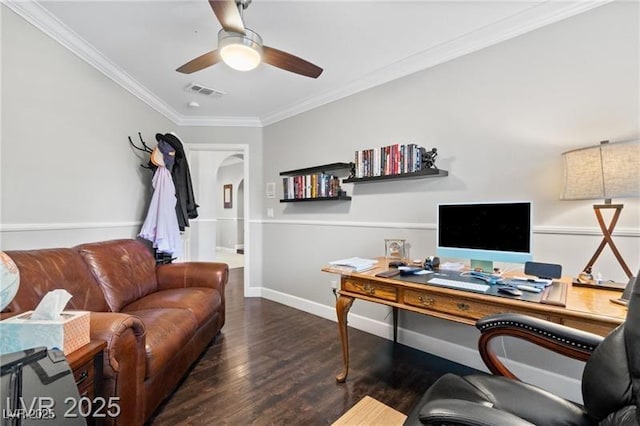 office space featuring baseboards, visible vents, ceiling fan, wood finished floors, and crown molding