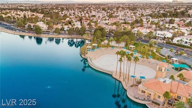 aerial view featuring a residential view and a water view