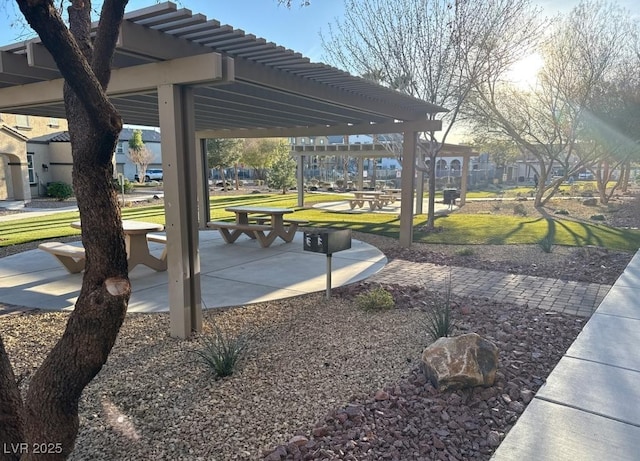 surrounding community with a pergola and a lawn