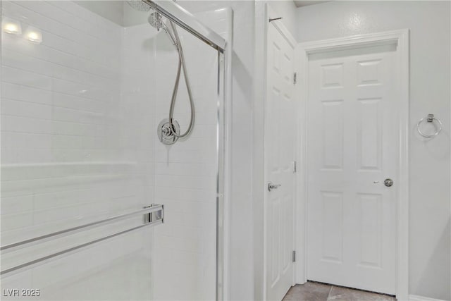 full bathroom featuring a shower stall