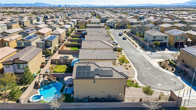 birds eye view of property with a mountain view and a residential view