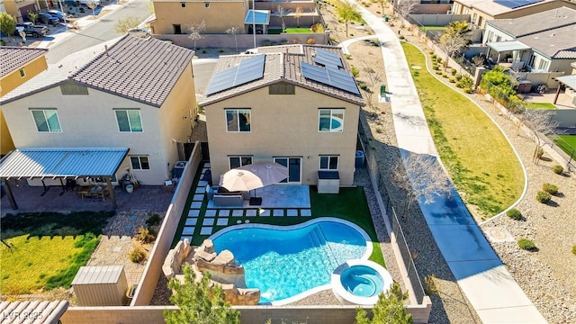 birds eye view of property with a residential view