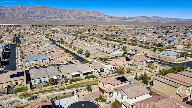 drone / aerial view with a residential view and a mountain view