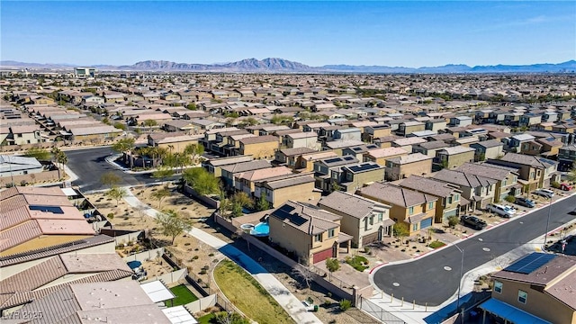 bird's eye view with a mountain view and a residential view