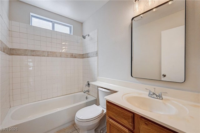 full bath featuring tile patterned flooring, shower / washtub combination, toilet, and vanity