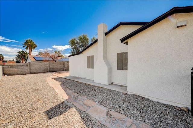 view of yard with a patio and a fenced backyard