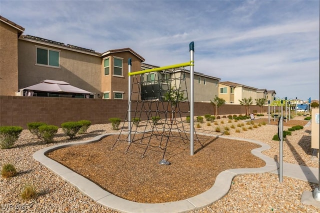 2598 Mocha Pearl Ct, North Las Vegas, NV 89086 - community playground with fence and a residential view