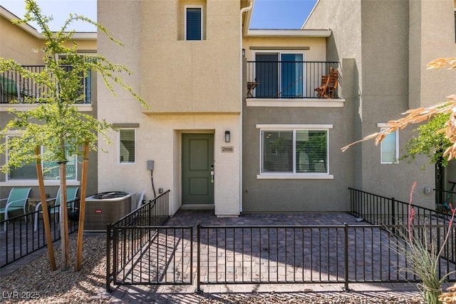2598 Mocha Pearl Ct, North Las Vegas, NV 89086 - exterior space with a patio, fence, stucco siding, and cooling unit