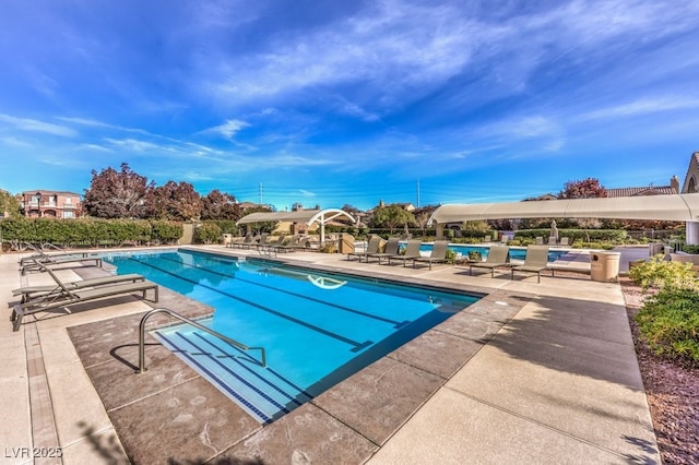 community pool featuring a patio