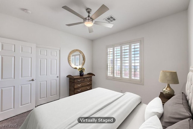 bedroom featuring ceiling fan and visible vents