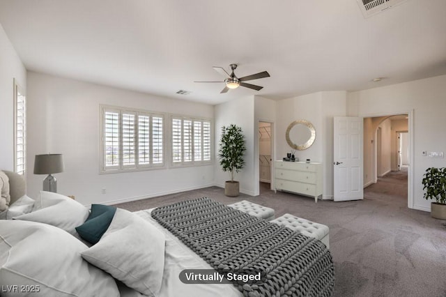 carpeted bedroom with baseboards, visible vents, and ceiling fan