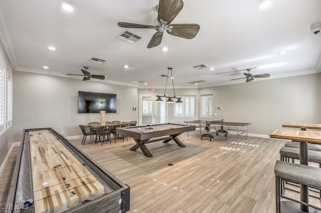 rec room with visible vents and ornamental molding