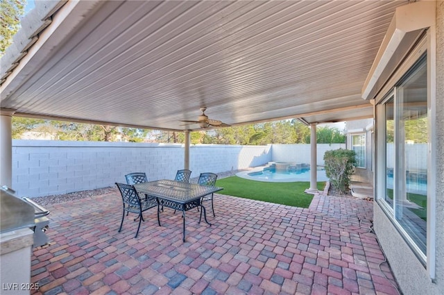 view of patio featuring a fenced backyard, outdoor dining area, a fenced in pool, and area for grilling