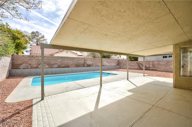 view of pool with a patio, a fenced backyard, and a fenced in pool