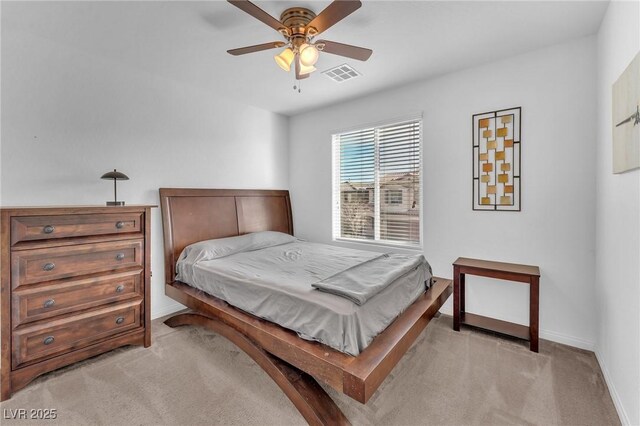 bedroom with carpet, visible vents, ceiling fan, and baseboards