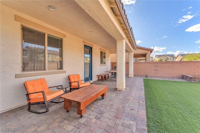 view of patio with fence