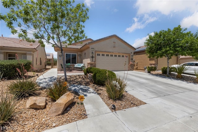 ranch-style home with driveway, an attached garage, and stucco siding