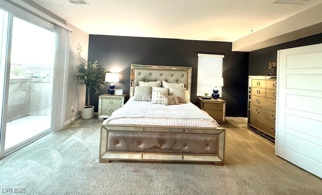 bedroom with visible vents, light colored carpet, baseboards, and access to outside