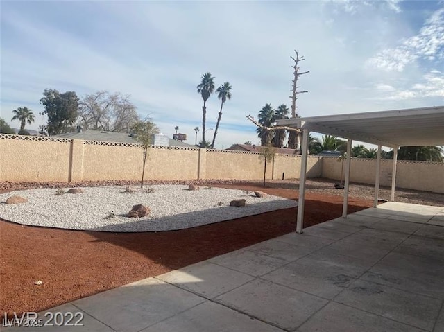 view of yard featuring a fenced backyard and a patio