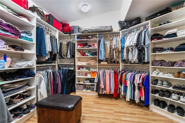 spacious closet with wood finished floors