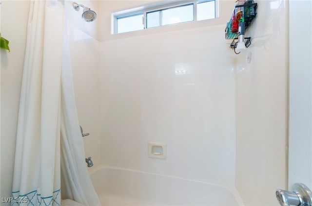 full bathroom with shower / tub combo with curtain