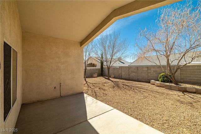 view of yard featuring a patio and a fenced backyard