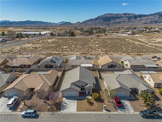 bird's eye view featuring a residential view and a mountain view