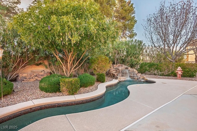 pool featuring a patio area