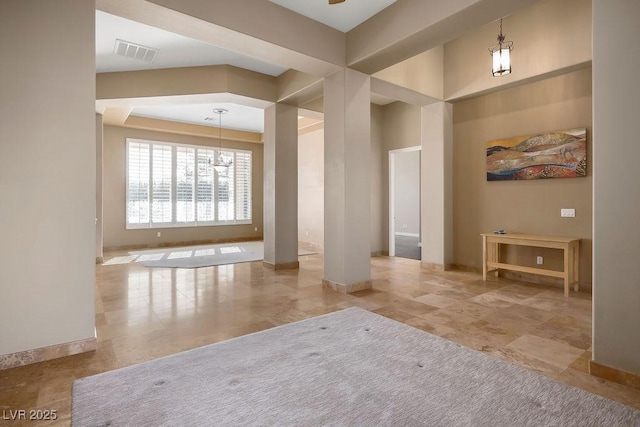 interior space with visible vents and baseboards