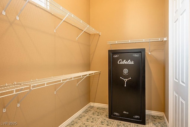 spacious closet featuring tile patterned floors