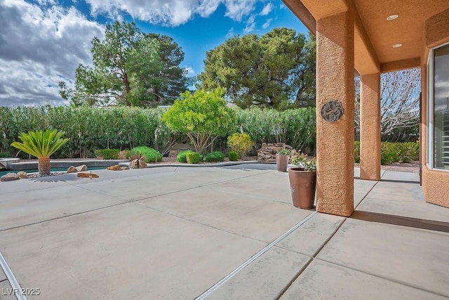 view of patio / terrace featuring an outdoor pool