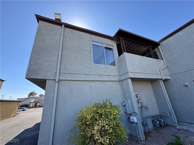 exterior space with stucco siding