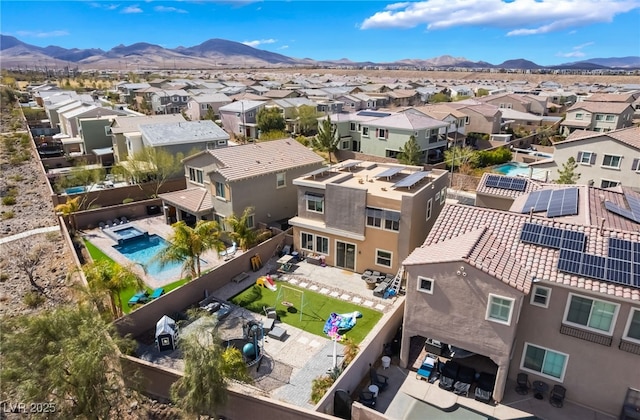 aerial view with a residential view and a mountain view