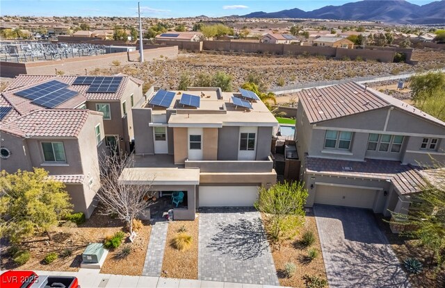 birds eye view of property featuring a residential view and a mountain view