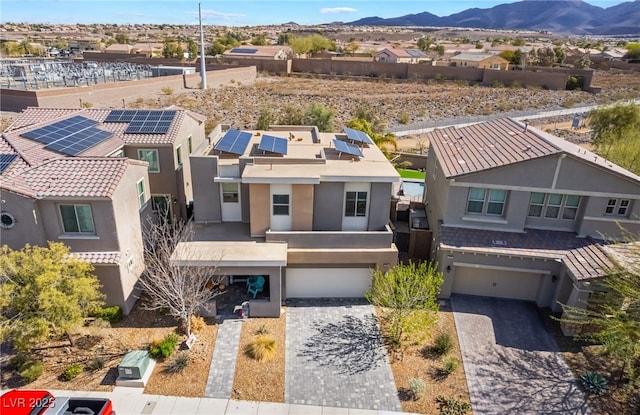 birds eye view of property with a residential view and a mountain view