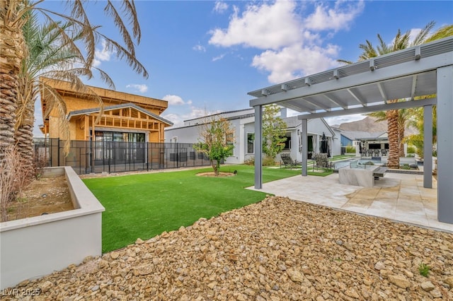 view of yard with a patio area, fence, and a pergola