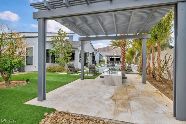 view of patio with an outdoor fire pit and a pergola