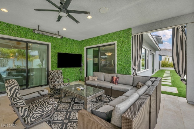 view of patio / terrace featuring ceiling fan and outdoor lounge area