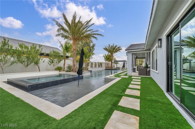 exterior space with a patio area, a fenced backyard, a fenced in pool, and an in ground hot tub