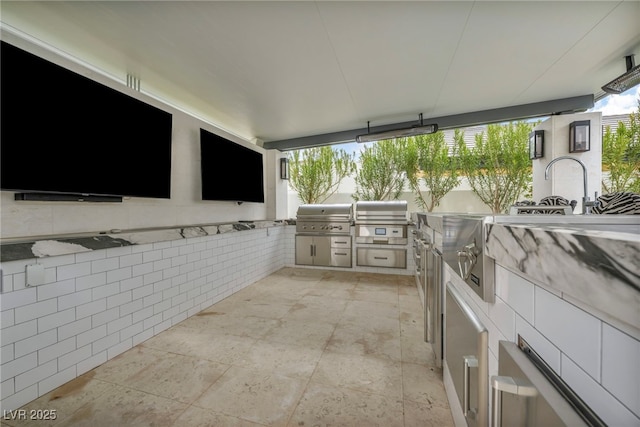 view of patio / terrace with exterior kitchen and grilling area