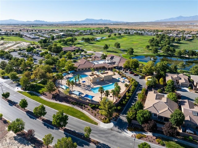 aerial view featuring a mountain view and golf course view