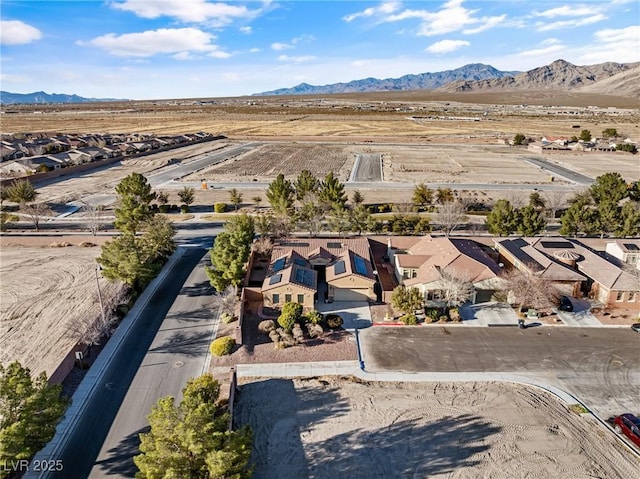 aerial view with a residential view and a mountain view