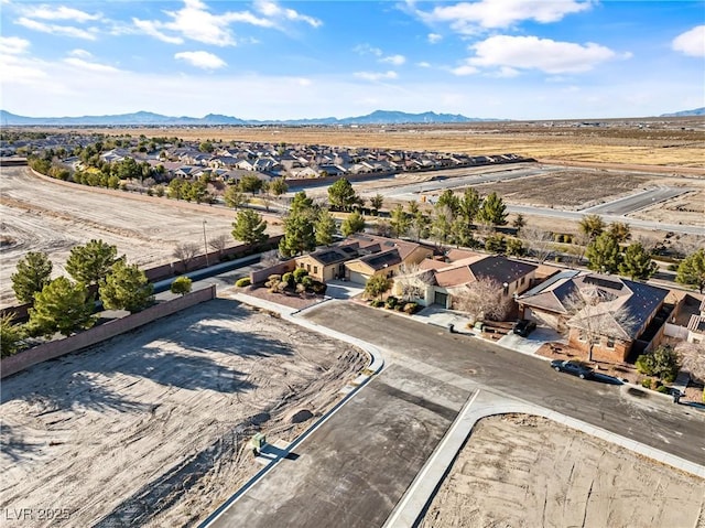 bird's eye view featuring a residential view and a mountain view