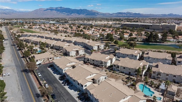 birds eye view of property with a residential view and a mountain view