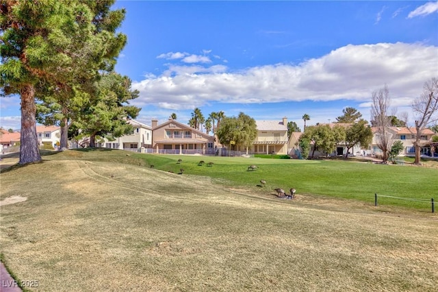 view of yard featuring a residential view